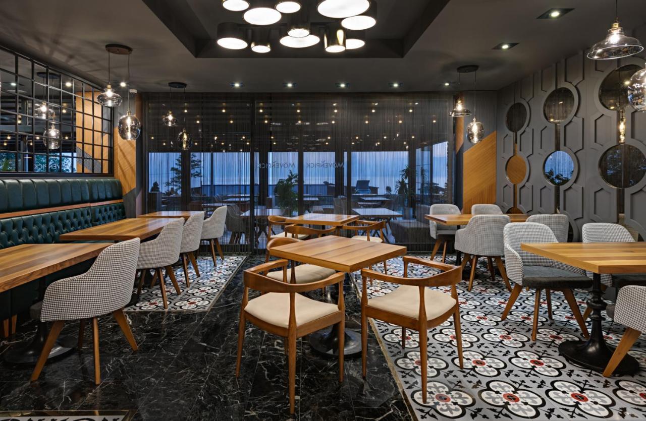 รอยัล เอซิส สวีท โฮเต็ล ทรับซอน Hotel ภายนอก รูปภาพ